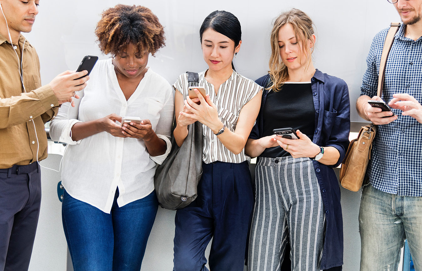employees using mobile device for e-learning