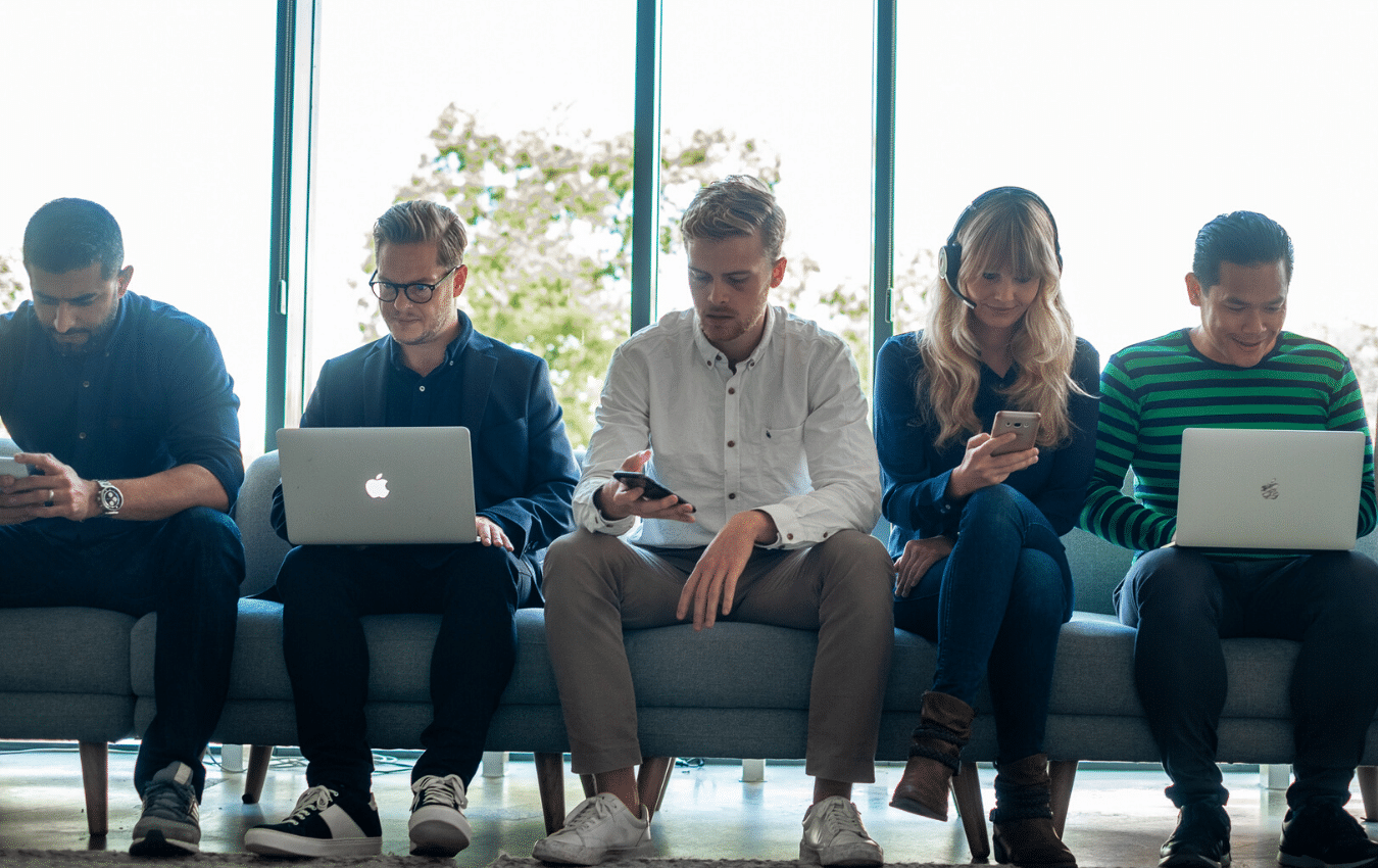 multi-generational workforce sitting on a couch