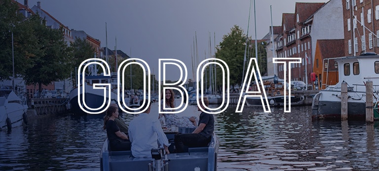 go boat logo with boats on the canal