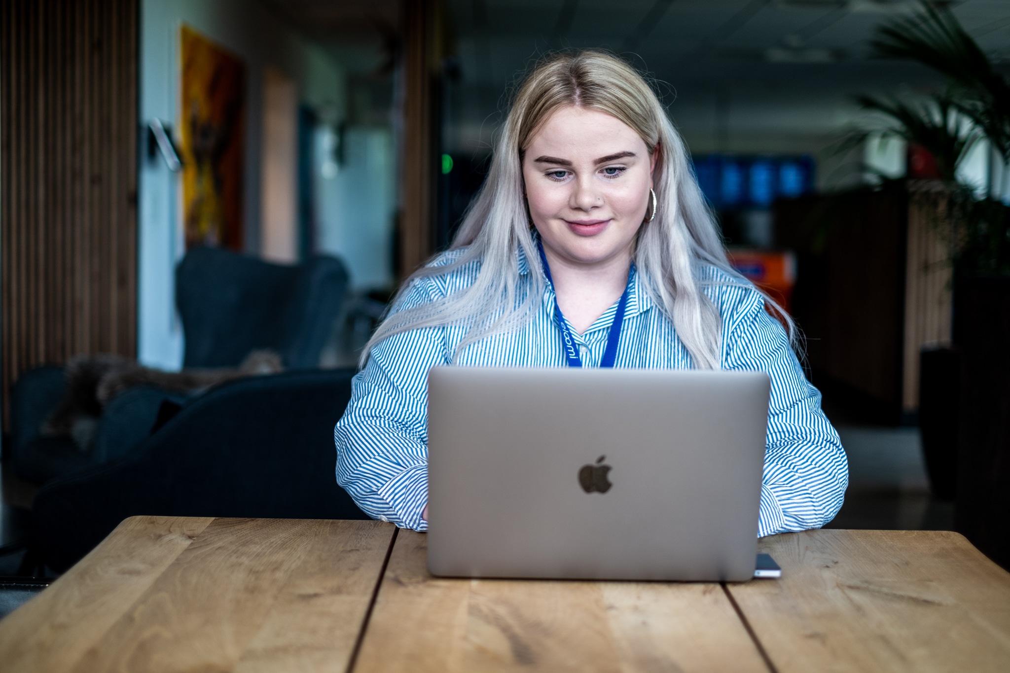 woman working in front of a laptop