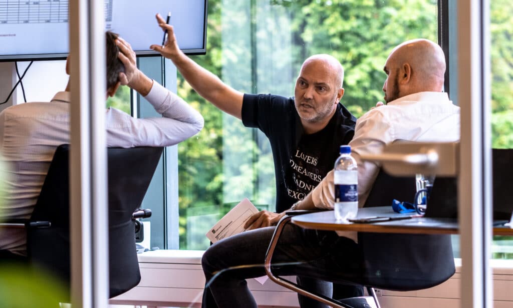 man presenting in open office space